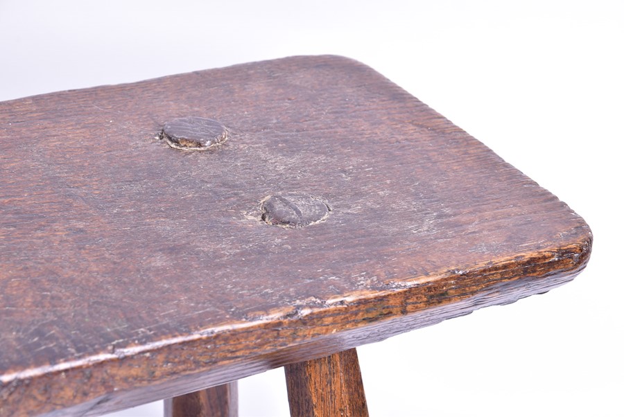 A mid eighteenth century provincial square oak milking stool 29 cm wide x 30 cm high, together - Image 2 of 4