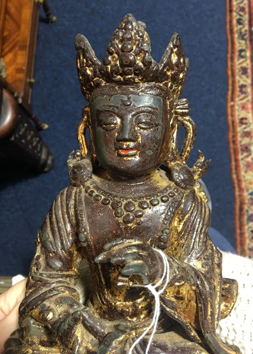 A 19th century or earlier Tibetan gilt bronze sculpture of Padmasambhava modelled seated in - Image 9 of 10