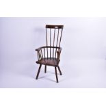 An early George III ash and elm comb-back Windsor armchair circa 1780, with bar back and spindles
