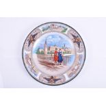 An early 20th century Wedgwood Etruia plate with Kremlin scene decorated with the coat-of-arms of