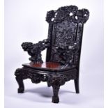 A large and impressive late 19th / early 20th century Chinese carved hardwood throne chair the