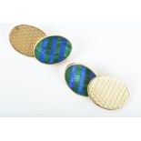 Asprey. A pair of 18ct yellow gold, malachite and lapis lazuli cufflinks of oval form, each with a