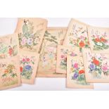 A collection of 20th century Chinese paintings on silk depicting birds in floral branches, and