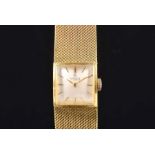 A Moeris 18ct yellow gold ladies wristwatch the square silvered dial with gilt baton hour markers,