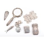 A miscellaneous group of silver and white metal items  comprising: a Continental silver hand mirror,