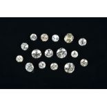 A group of loose round brilliant-cut diamonds of varying sizes, approximately 6.20 carats