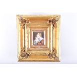 A 19th century portrait miniature  depicting a mother embracing her child, housed in a gilt gesso