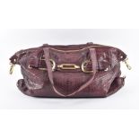 Jimmy Choo. A dark purple leather and snakeskin handbag approximately 47 cm wide, together with