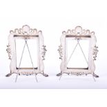 A pair of Chinese export ware silver picture frames circa 1900, with pierced scroll and floral