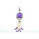An impressive silver gilt, diamond, amethyst and pearl pendant centred with a large rose-cut