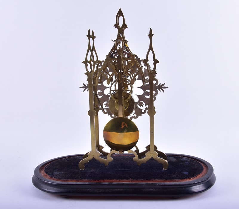 A brass skeleton clock  mounted to an ebonised plinth with glass dome, 48 cm high x 37 cm wide (full - Image 4 of 4