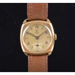 A 1950s Tudor 9ct gold mechanical wristwatch the silvered dial with Arabic numerals and baton hour