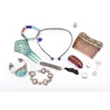 A group of costume jewellery items to include a silver and turquoise bangle, possibly Mexican, a