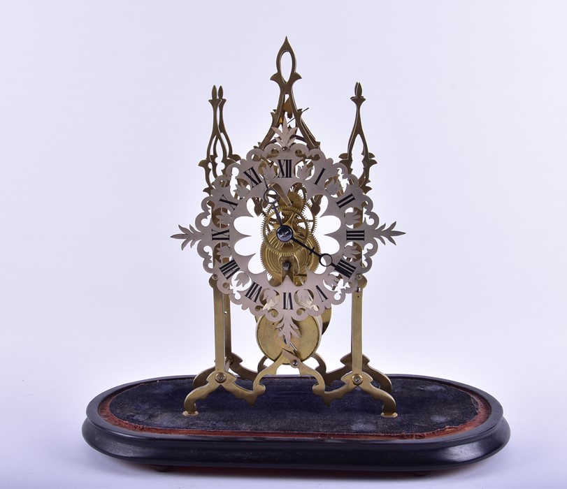 A brass skeleton clock  mounted to an ebonised plinth with glass dome, 48 cm high x 37 cm wide (full - Image 2 of 4