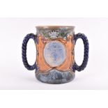 A Royal Doulton stoneware Nelson commemorative loving cup with a named and dated blue oval cameo