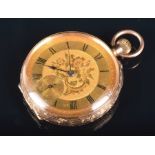 An early 20th century 9ct gold open face fob watch the gilt dial with black Roman numerals, in a