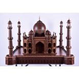 A large and accurate hand-built scale model of the Taj Mahal in Burmese teak the wood dating from