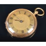 A Victorian 18ct yellow gold ladies fob watch with gilt dial and black Roman numerals, the case back