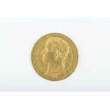 A French 40 franc gold coin dated 1811.