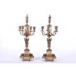 A pair of French 19th century ormolu candelabra in the neo-classical style, with six lights with