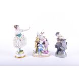 A Frankenthal porcelain figural group modelled as a father with his three children sat on a bench