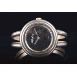 A 1975 Roy King Silver bracelet wristwatch the black minimalist dial with silver stick hands, with