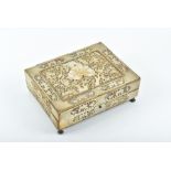 A 19th century Chinese mother-of-pearl mounted box the lid deeply carved and decorated with flowers,