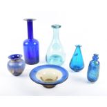 A Dartington Studio glass vase of bulbous form with gold leaf decor on a cobalt blue ground,