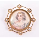 A yellow metal portrait miniature brooch of circular form, depicting an ornately dressed young