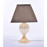 A large contemporary Murano glass table lamp of fluted baluster form with gold decoration, and