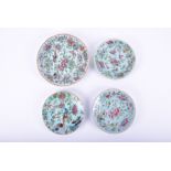 Four Chinese celadon famille rose dishes  19th century and later, decorated with butterflies,