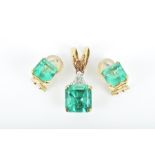 A gold, diamond and emerald pendant set with a square-cut emerald weighing approximately 4.50