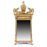 A large and elaborately decorated gilt framed wall mirror 20th century, manner of Robert Adam,