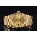 A Rolex 18ct yellow gold Day Date Oyster Quartz Ref. 19018N wristwatch c.1987, the gilt dial with