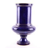 An impressive 19th century Sevres Dore vase in cobalt blue ground with gold banding, the cylindrical