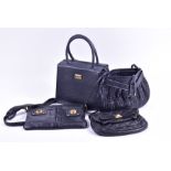 A Marc by Marc Jacobs cross-body black leather bag along with a Marc Jacobs clutch in quilted