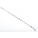 An 18ct white gold and diamond bracelet comprised of round segments inset with diamonds,