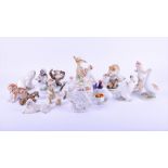 A collection of early 20th century Russian porcelain figures  all with different makers marks,