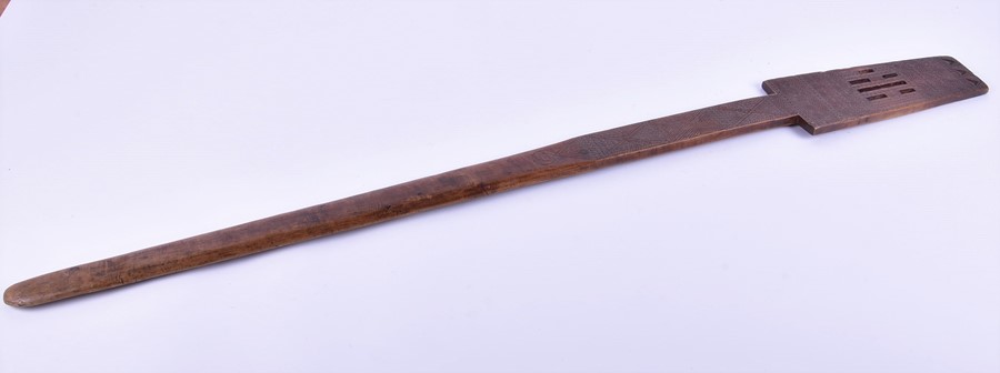 A Polynesian hardwood paddle decorated with pierced head and miniature tightly carved geometric - Image 3 of 8
