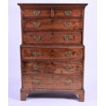 A Georgian mahogany chest on chest with moulded cornice above two short drawers on a graduated set