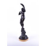A late 19th/early 20th century patinated bronze sculpture probably Italian, modelled as a nude