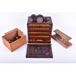 A mahjong set in bespoke camphor box with crawling dragon handle along with a boxed collection of