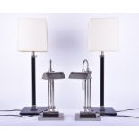A pair of polished chrome telescopic industrial table lamps by Valsan 40 cm high; together with a