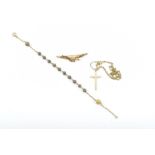 A yellow metal rosary bracelet 22 cm long; a cross pendant, marked 9ct, on an 18 carat gold chain;