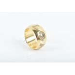 Bulgari. An 18ct yellow gold and diamond monologo ring inset with the word 'Bvulgari' in diamonds,