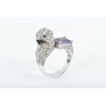An unusual 18ct white gold, diamond, and amethyst cocktail ring in the form of a parrot, with a