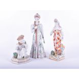 A Dulevo Soviet porcelain figure 'Mistress of Copper Mountain' circa 1960's, along with another