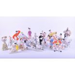 A group of 20th century Russian porcelain figures various marks, modelled as skiiers, bathers,