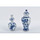 Two late 17th / early 18th century Chinese Kangxi period small blue and white vases one of double
