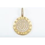 Bulgari. An 18ct yellow gold and diamond pendant of circular form, the centre pavé-set with round
